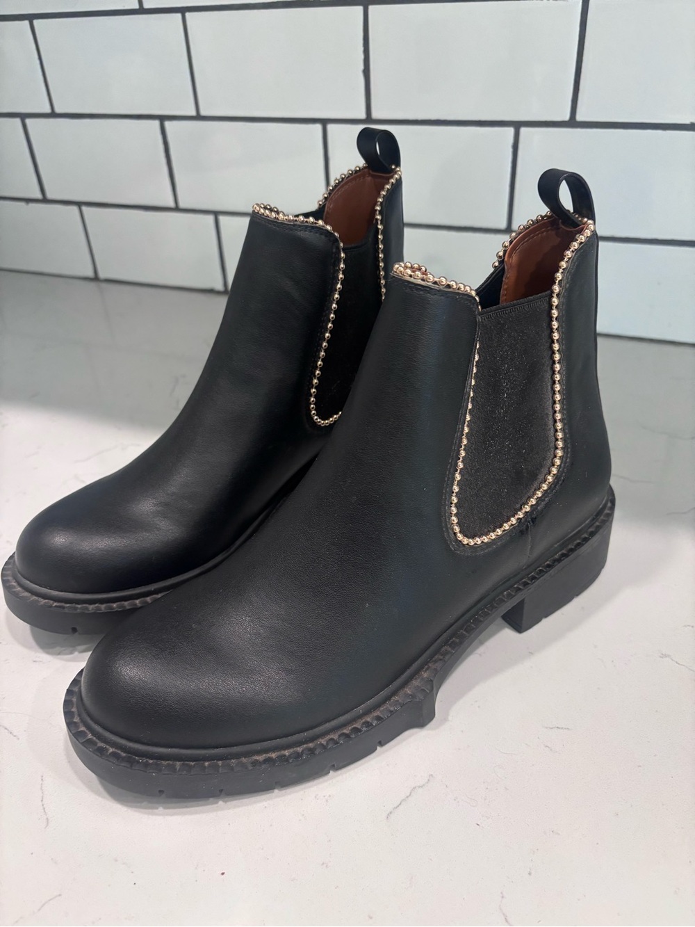 Coach Black Chelsea Booties with Gold Bead Trim
